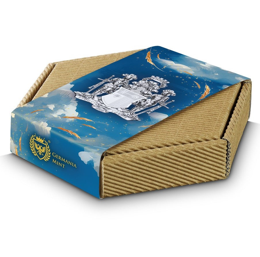A square cardboard product box with a decorative blue lid featuring a silver coat of arms, clouds, and gold accents, plus the text 'GERMANIA MINT' on the side, photographed on a white background.