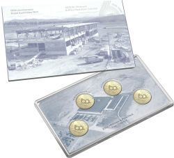 A set of four collectible coins with a depiction of a mint press on the reverse, accompanied by a card with a minting machine image.