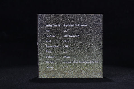 Silver coin in a protective case with embossed text on a black background