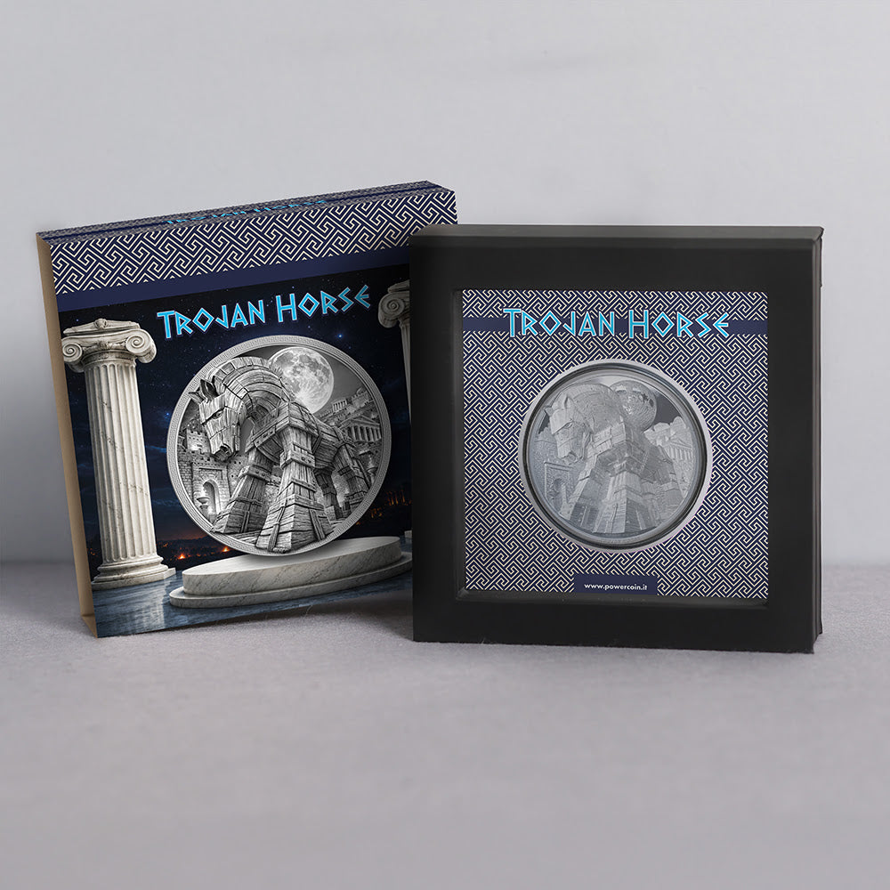 A framed and boxed collectible featuring a circular silver-toned relief of the Trojan Horse, shown with its illustrated outer box on a light gray studio background.