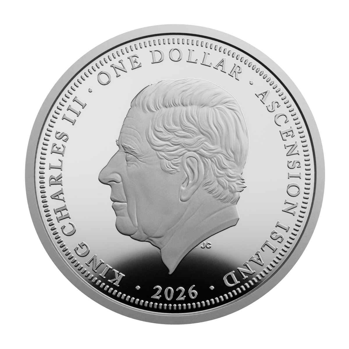 A round silver-colored commemorative coin featuring a profile portrait of King Charles III, with the text 'ONE DOLLAR', 'ASCENSION ISLAND', and '2026' around the edge, shown on a plain white background.