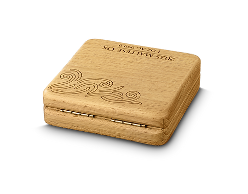 Wooden coin box with engraved design and text on a white background