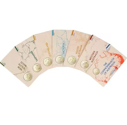 Set of six paper fan maps of Australia with gold coins on a white background