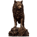 Front view of the Celtic Wolf copper statue, showing its decorated forehead, textured chest and patterned rocky base.