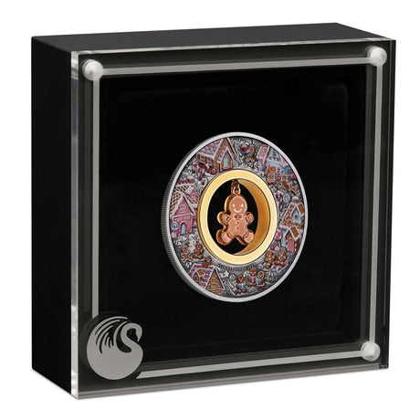 Perth Mint Gingerbread Christmas silver coin in its clear-lidded display case, showing the coloured village and central gingerbread man.