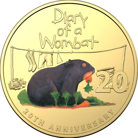Gold coin with a wombat illustration and text 'Diary of a Wombat' and '20th Anniversary'.