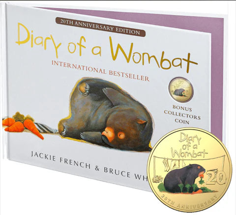 Book titled 'Diary of a Wombat' with a 20th Anniversary Edition label and a bonus collectors coin on a white background.