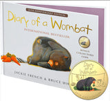 Book titled 'Diary of a Wombat' with a 20th Anniversary Edition label and a bonus collectors coin on a white background.