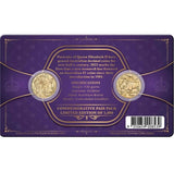 Purple packaging with gold coins and text for Queen Elizabeth II and King Charles III, 1984 and 2023.