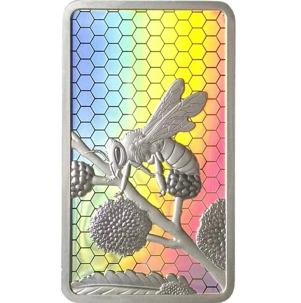 Metallic bee on a branch with berries against a colorful honeycomb pattern