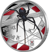 Coin featuring a red-back spider design on a white background
