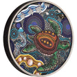 A round collectible coin featuring a detailed Aboriginal art design of a sea turtle, jellyfish, and waves, with the year 2026 inscribed on the side.