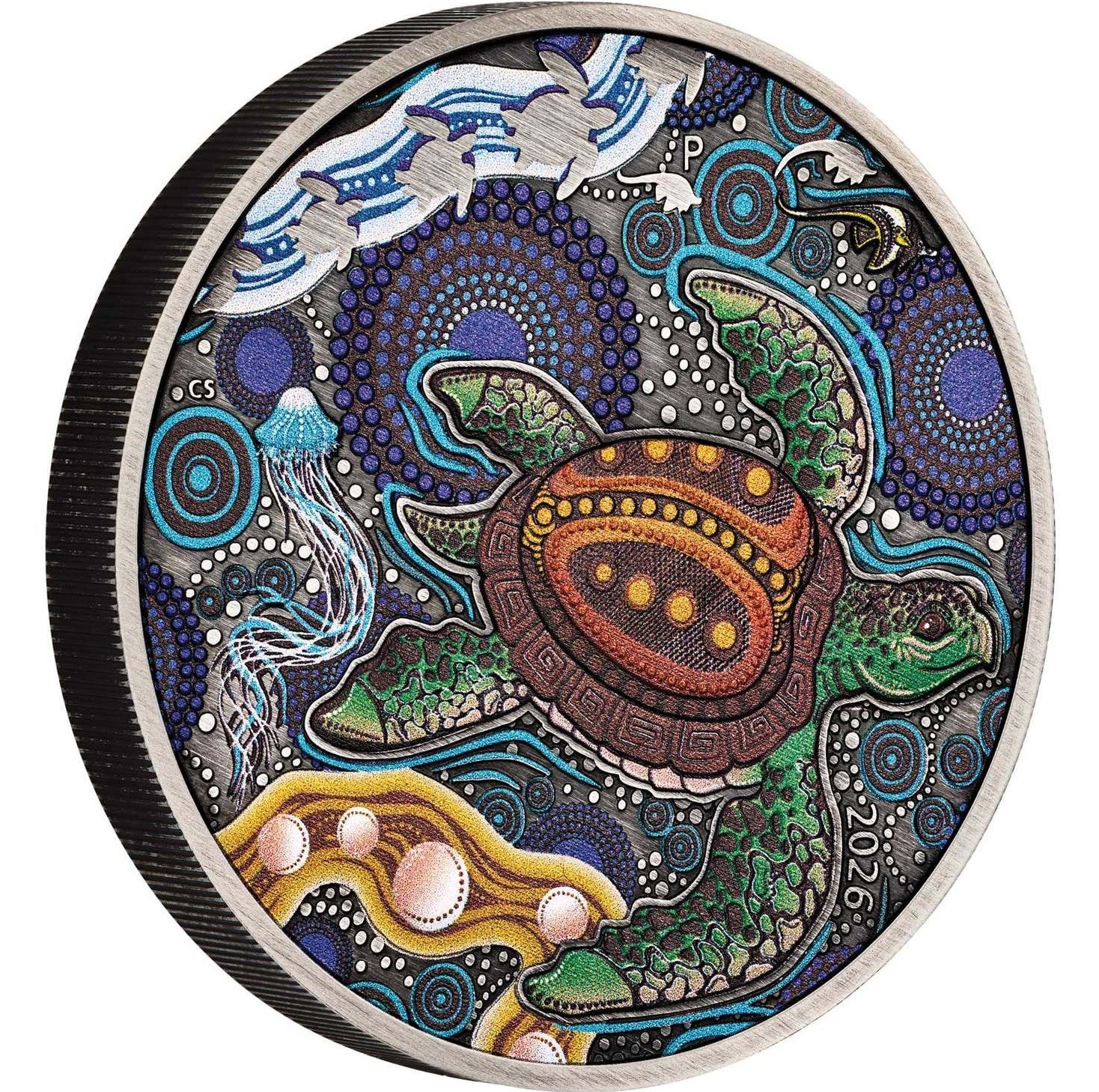 A round collectible coin featuring a detailed Aboriginal art design of a sea turtle, jellyfish, and waves, with the year 2026 inscribed on the side.