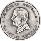 A circular silver coin featuring a profile portrait of Charles III, with the text 'CHARLES III AUSTRALIA' around the border and '2 OZ 9999 Ag 2 DOLLARS' at the bottom, shown on a plain white background.