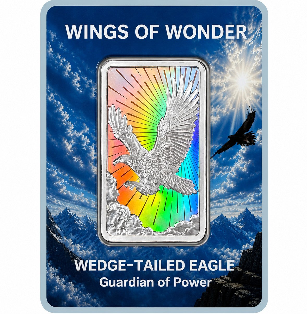 A silver wedge-tailed eagle coin or medallion displayed on a branded backing card. The card reads 'WINGS OF WONDER' and 'WEDGE-TAILED EAGLE Guardian of Power,' with a blue sky, clouds, mountains, sun, and eagle silhouette in the background.