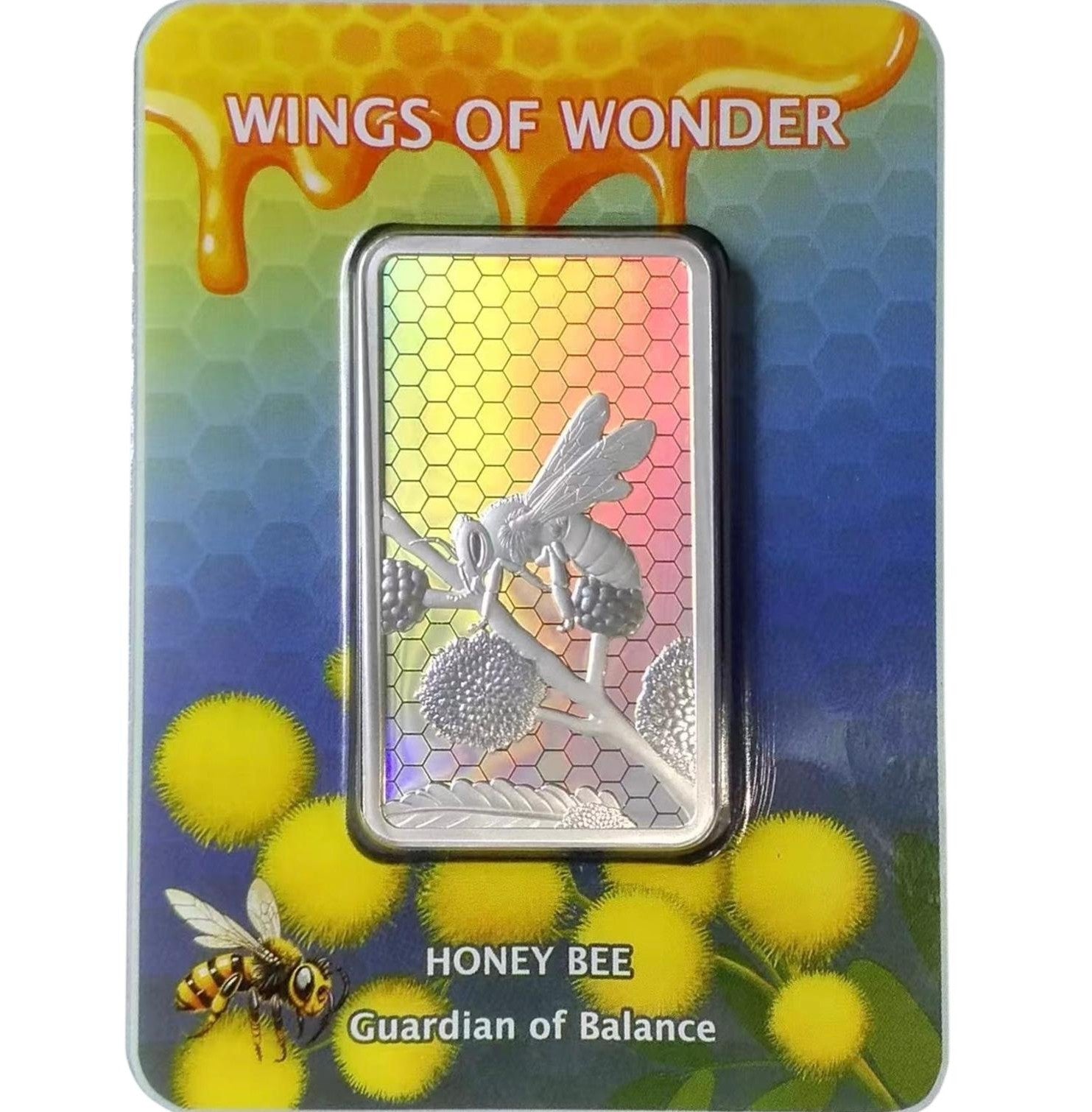 Silver honey bee bar in packaging with 'Wings of Wonder' branding and honeycomb design.