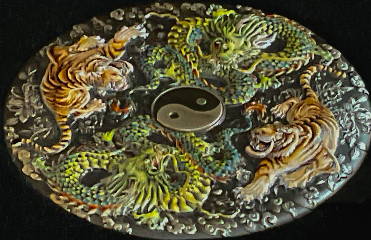 Angled view of Tuvalu 2023 5 dollar Double Dragon and Double Tiger 5oz silver antiqued coloured coin reverse side featuring two dragons and two tigers around a colourful yin yang symbol.