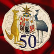 Reverse, main view: Australia 2012 hyper-metallic 50-cent coin with coloured kangaroo, emu, Coat of Arms shield and purple denomination on red satin.