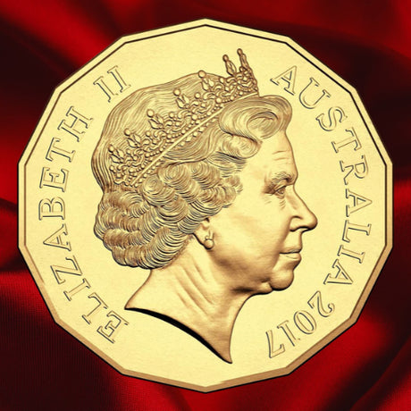Obverse, new second image: Australia 2017 WMF gold-plated 50-cent coin showing Queen Elizabeth II’s crowned portrait and ELIZABETH II AUSTRALIA 2017 inscriptions on red satin.