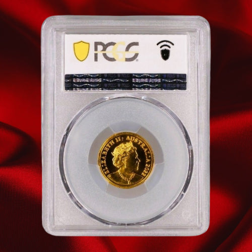 Obverse: Queen Elizabeth II obverse of the Australia 2022-C $2 coin in its PCGS holder, shown against red satin.