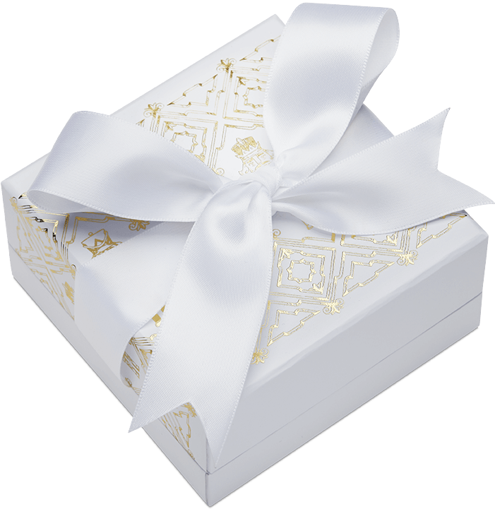 White Christmas Nutcracker gift box with gold decorative detailing and a large white ribbon bow