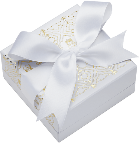 White Christmas Nutcracker gift box with gold decorative detailing and a large white ribbon bow