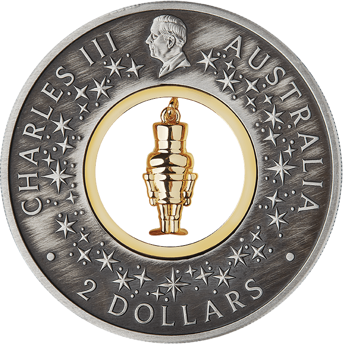 King Charles III obverse of the Australian two dollar Nutcracker coin, with stars and a gold-plated figurine insert
