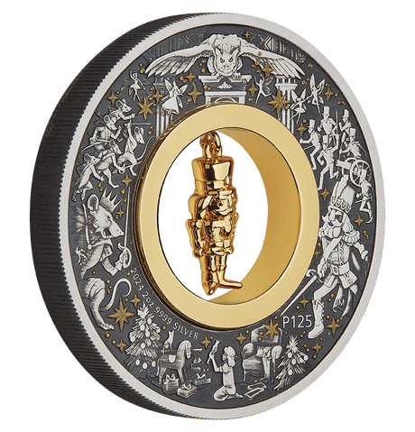 Close angled reverse of the Christmas Nutcracker coin showing festive relief, P125 mintmark and gold-plated figurine