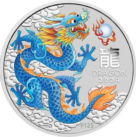 A colored silver coin with an image of a blue dragon and a flaming pearl on it, from Australia, presented in a card.