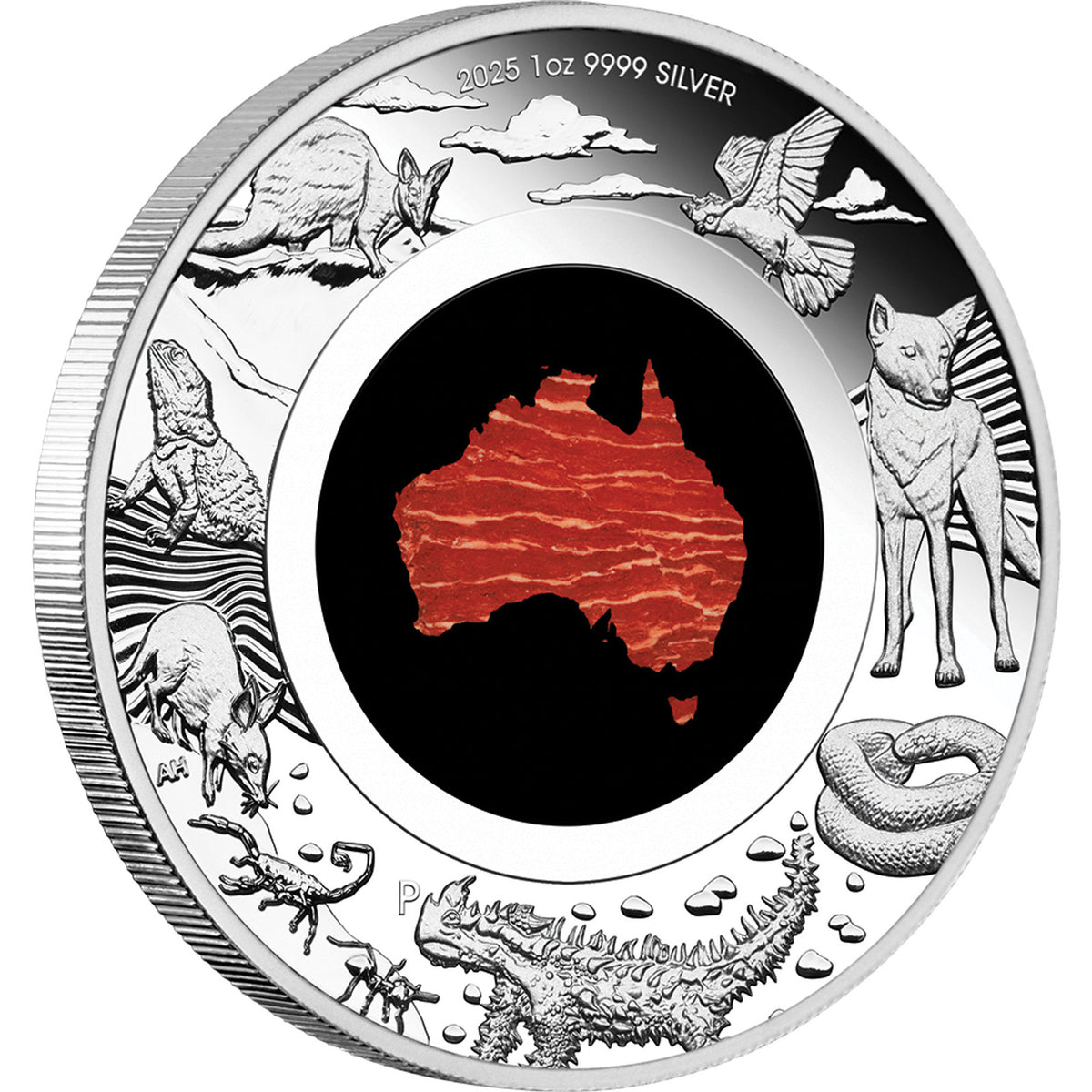 Silver coin with Australian animals and a map of Australia on a white background