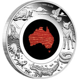 Silver coin with Australian animals and a map of Australia on a white background