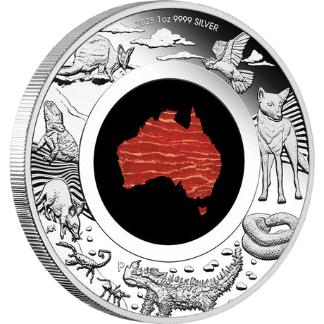 Silver coin with Australian animals and a map of Australia on a white background