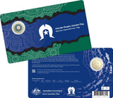 Card with a coin featuring the Torres Strait Islander flag design, issued by the Australian Government Royal Australian Mint.