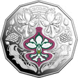 Decorative coin with floral design and '2025' text on a white background