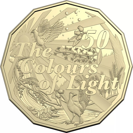 The Colours of Light 50-cent coin reverse, showing native birds, foliage and radiating sunlight.