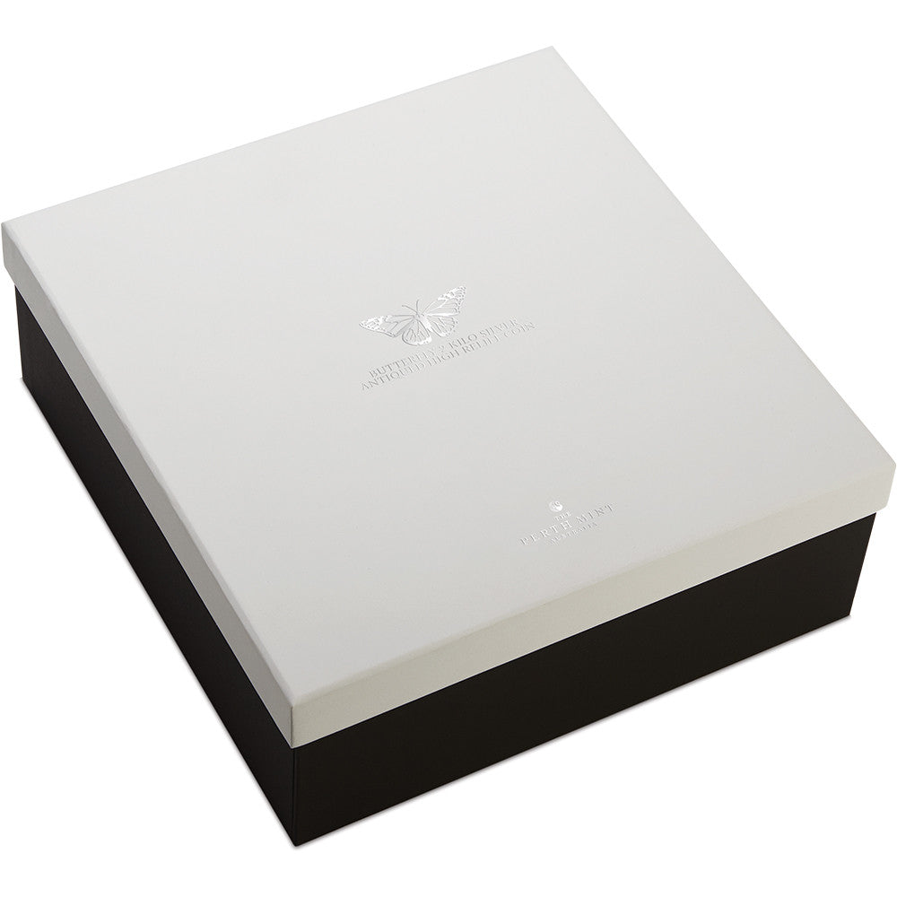 White jewelry box with a black base on a white background