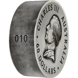 Silver coin with a portrait and text 'Charles III Australia 60 Dollars' on a white background Numbered Rim