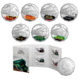 Set of Cupro Nickel coins with train designs and a display folder on a white background