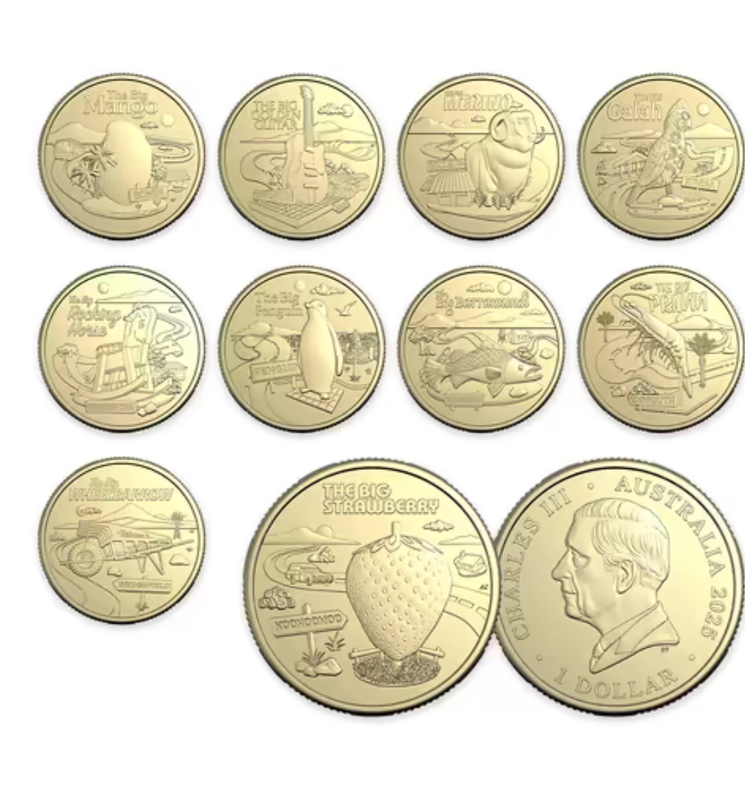 Set of gold coins with various designs on a white background