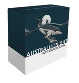 A collectible coin packaging with an illustration of a bottlenose dolphin and its calf, with the text 'AUSTRALIA AT NIGHT BOTTLENOSE DOLPHIN' on the upper part.
