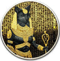  coin featuring an Egyptian cat deity in gold and black attire with hieroglyphs