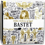 Product packaging with Egyptian-themed design and text 'Golden Darkness of Egypt Bastet'.