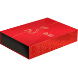 Red gift box with decorative patterns on a white background
