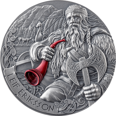 A silver coin with an antique finish featuring a detailed relief of a Viking explorer holding a battle axe and a horn, with a mountainous landscape in the background.