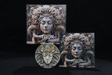 Three decorative head sculptures with 'Naga' inscribed on a dark background