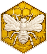A high relief silver coin with an image of a honeybee on a honeycomb background, minted in Cameroon with a face value of 2000 francs CFA.