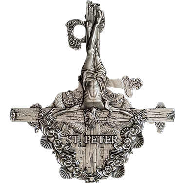 A silver coin with a detailed relief showing the crucifixion of St. Peter, surrounded by ornate designs, with the inscription 'ST.