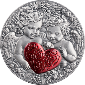 Silver coin with cherubs holding a red heart engraved with 'Eternal Love', surrounded by decorative elements.