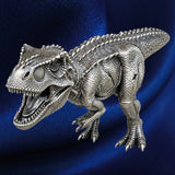 Three-quarter view, blue backdrop: Tyrannosaurus rex antiqued silver coin with open jaws, textured scales and clawed feet against a blue background.