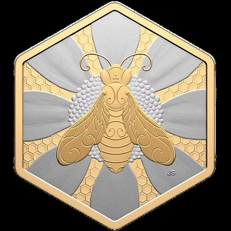 Decorative hexagonal bee coin design with gold and silver colors on a black  background